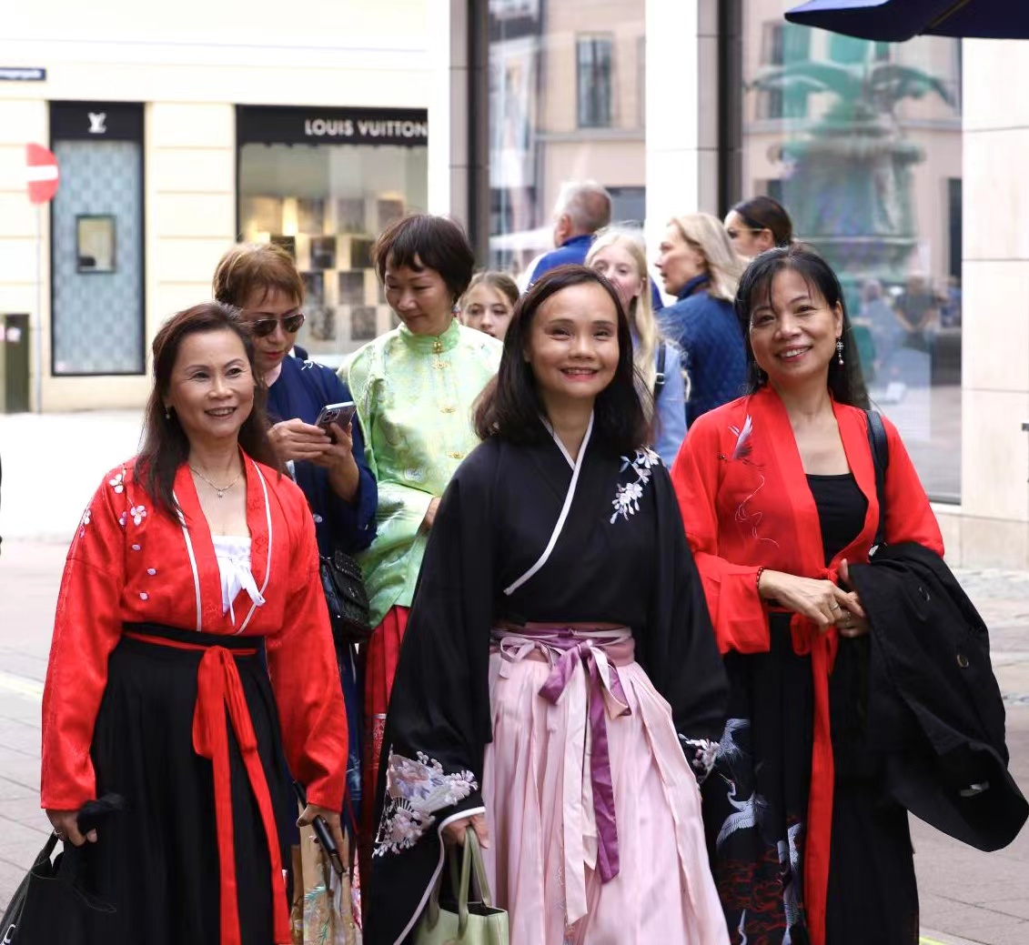 Hanfu enthusiasts walking together in central Copenhagen